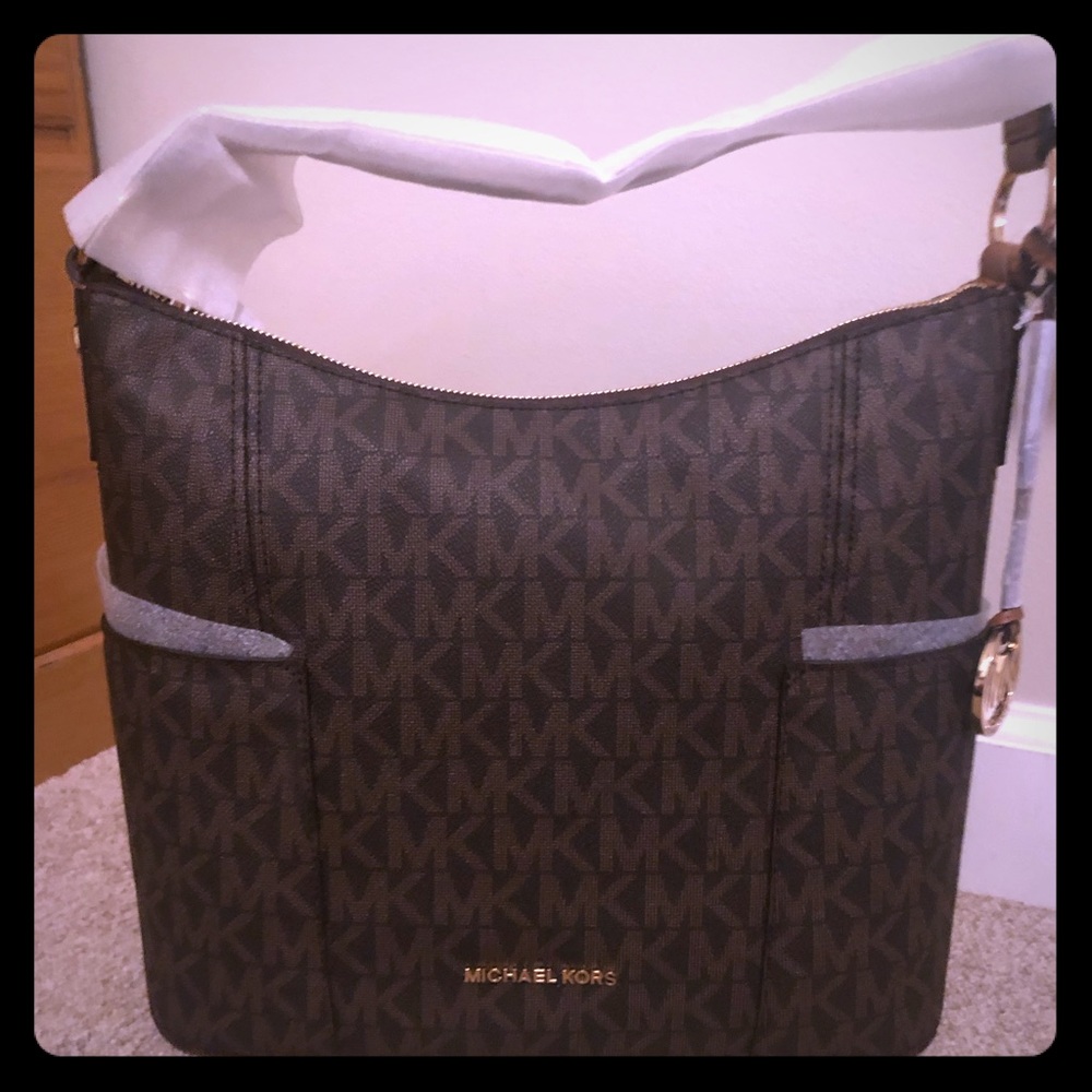 Authentic Michael Kors “Anita” shoulder bag/cross